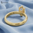 Back view of a 1.5 carat marquise cut lab-grown diamond solitaire engagement ring in 18kt yellow gold with a 4-claw setting