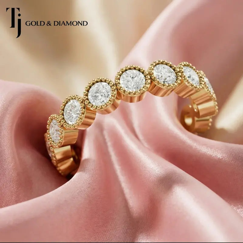Luxury milgrain bezel setting full eternity diamond wedding band crafted in 18kt yellow gold with round brilliant lab-grown diamonds.