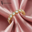 Full eternity diamond wedding band featuring a milgrain bezel setting in 18kt yellow gold with round brilliant lab-grown diamonds.