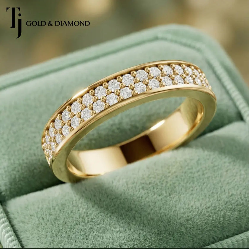 Angled view of Multi-Row Pavé Half Eternity diamond wedding band in 18kt yellow gold, showing two rows of round brilliant diamonds