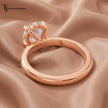 Back view of a 1.5 carat oval cut lab-grown diamond solitaire engagement ring in 18kt rose gold with a 4-claw setting