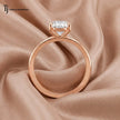Front-on view of a 1.5 carat oval cut lab-grown diamond solitaire engagement ring in 18kt rose gold with a 4-claw setting
