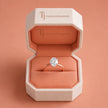 1.5 carat oval cut lab-grown diamond solitaire engagement ring in 18kt rose gold in a TJ Diamond box