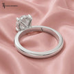 Back view of a 1.5 carat oval cut lab-grown diamond solitaire engagement ring in 18kt white gold with a 4-claw setting