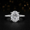 Front view of a 1.5 carat oval cut diamond solitaire engagement ring in an 18kt white gold 4 claw setting by TJ Diamond