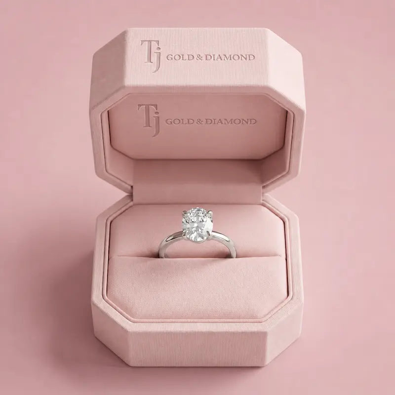1.5 carat oval cut lab-grown diamond solitaire engagement ring in 18kt white gold in a TJ Diamond box