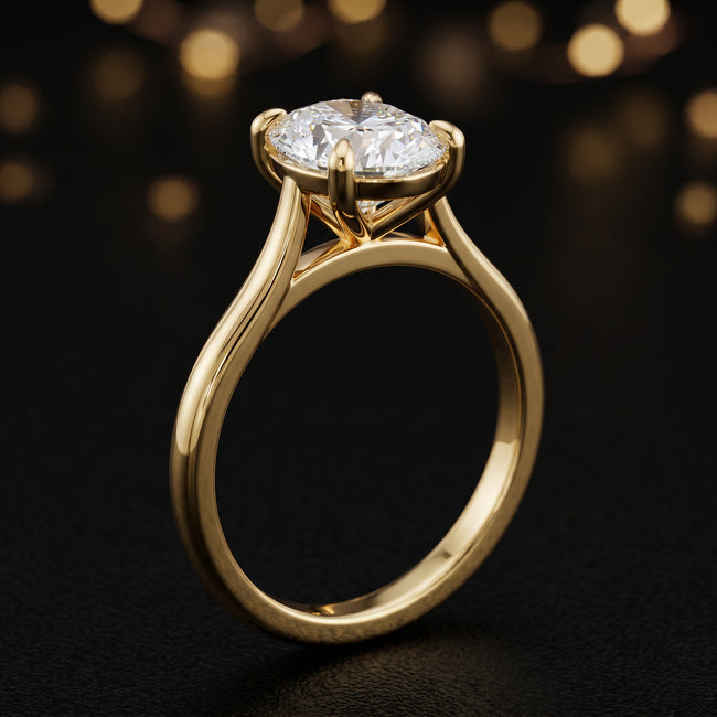 4-Claw Oval Cut Solitaire Diamond Ring - Yellow Gold