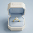 1.5 carat oval cut lab-grown diamond solitaire engagement ring in 18kt yellow gold in a TJ Diamond box