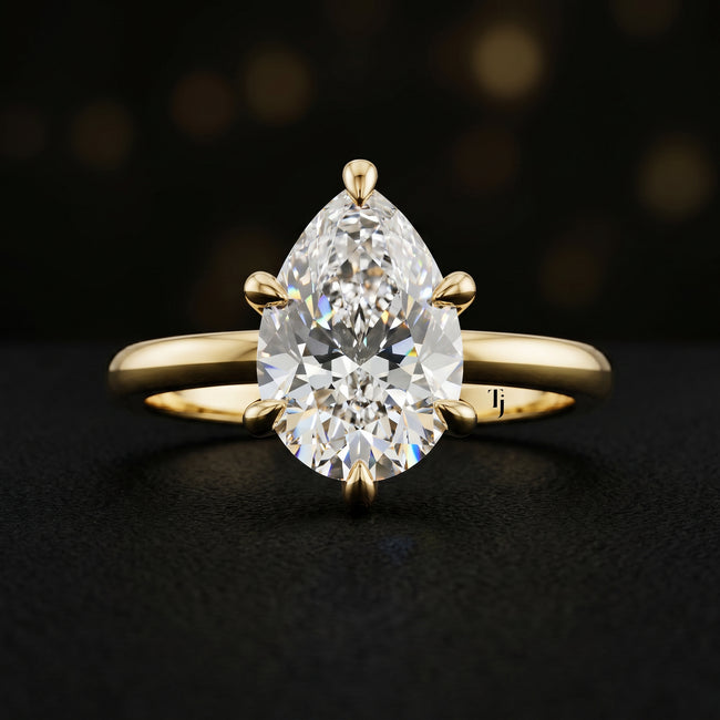6-Claw Pear Cut Solitaire Diamond Ring - Yellow Gold
