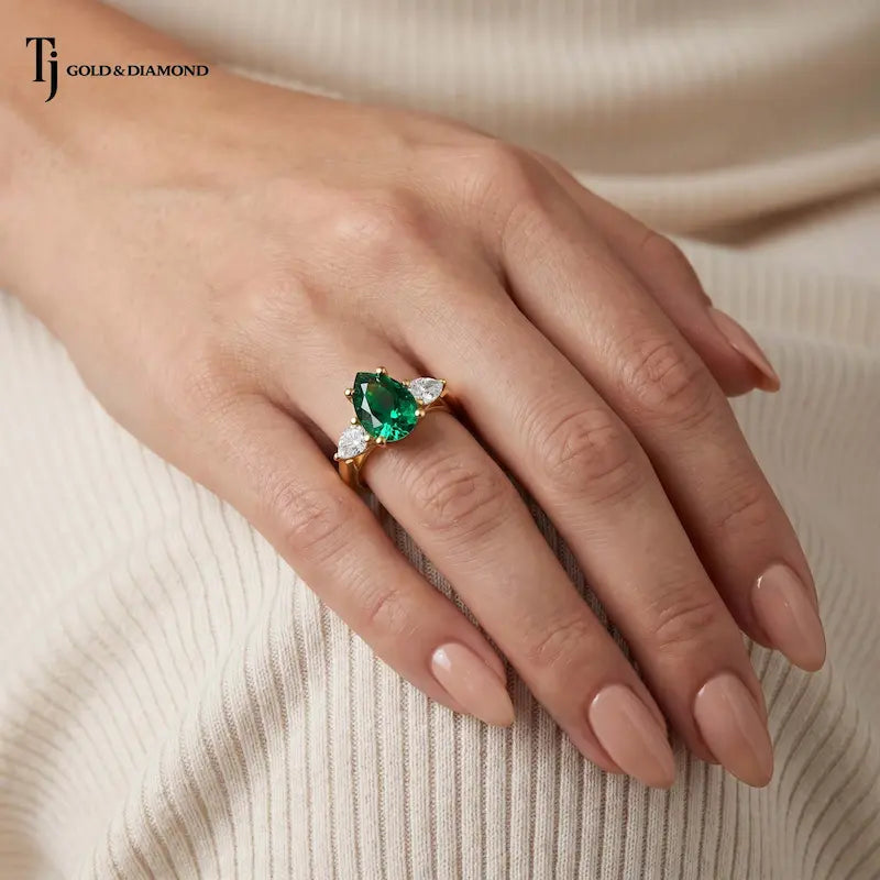 Pear Cut Created Emerald & Diamond Trilogy Ring – 18kt Yellow Gold