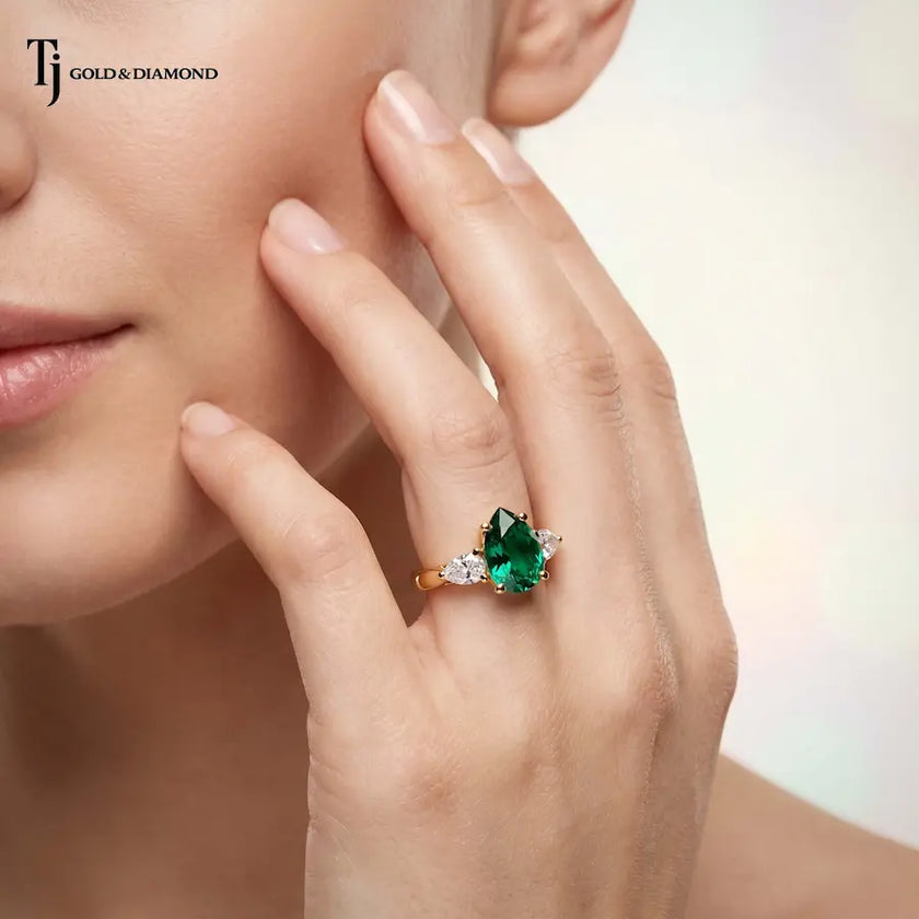 Pear Cut Created Emerald & Diamond Trilogy Ring – 18kt Yellow Gold