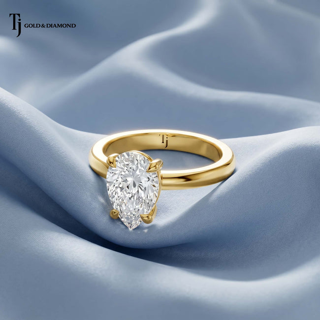4-Claw Pear Cut Solitaire Diamond Ring - Yellow Gold