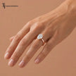 1.5 carat pear cut lab-grown diamond solitaire engagement ring in 18kt rose gold worn on hand