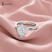 Front view of a 1.5 carat pear cut lab-grown diamond solitaire engagement ring in 18kt white gold with a 4-claw setting