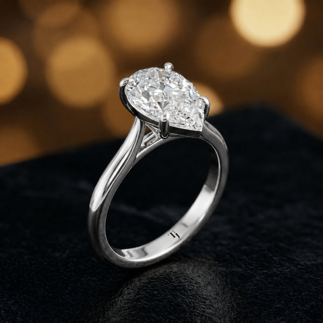 4-Claw Pear Cut Solitaire Diamond Ring - White Gold