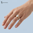 1.5 carat pear cut lab-grown diamond solitaire engagement ring in 18kt yellow gold worn on hand
