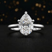 Front view of a 1.5 carat pear cut diamond solitaire engagement ring in an 18kt white gold 6 claw setting by TJ Diamond