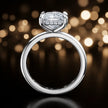 Front view of 4-claw princess cut engagement ring with hidden halo in 18kt white gold