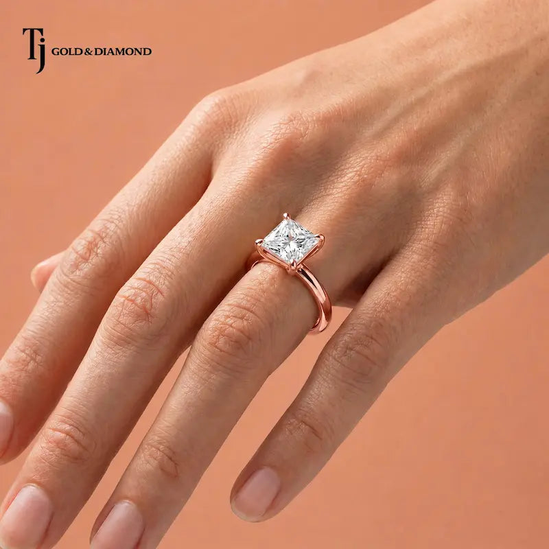 1.5 carat princess cut lab-grown diamond solitaire engagement ring in 18kt rose gold worn on hand
