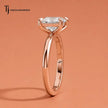 Side profile of a 1.5 carat princess cut 4-claw solitaire engagement ring in 18kt rose gold