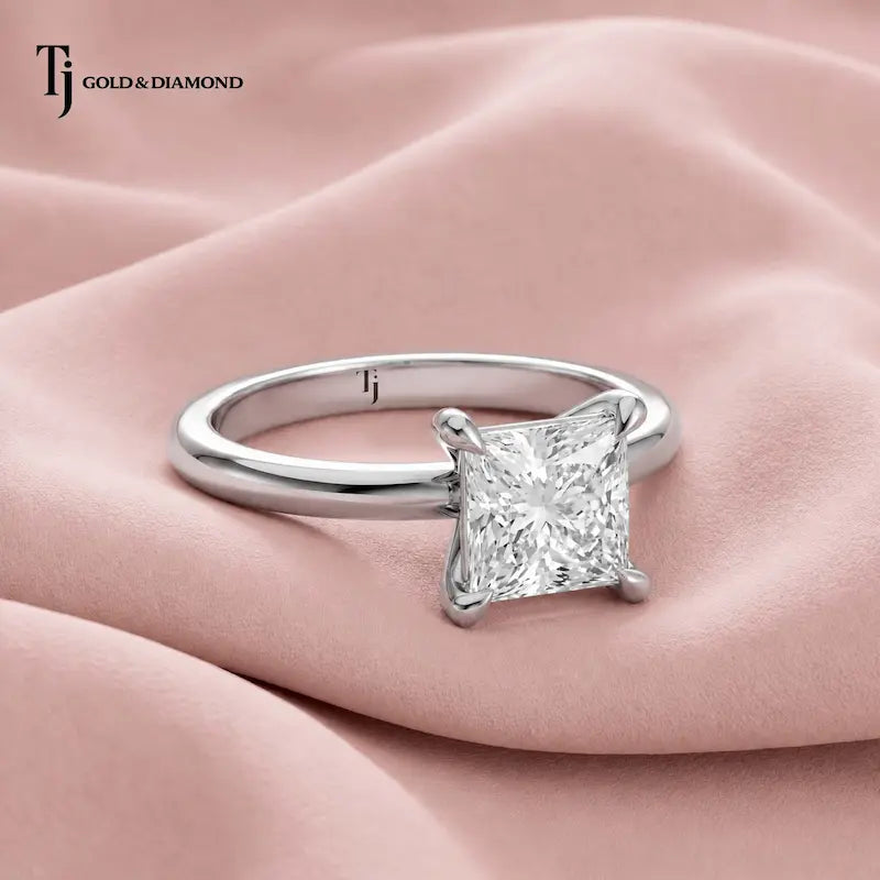 Front view of a 1.5 carat princess cut lab-grown diamond solitaire engagement ring in 18kt white gold with a 4-claw setting