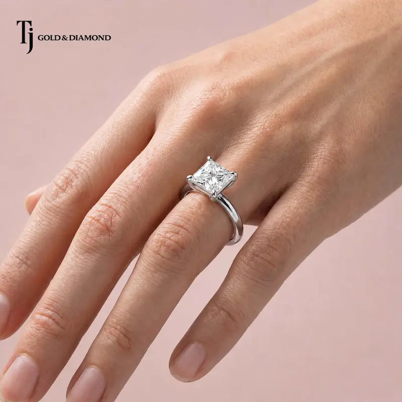 1.5 carat princess cut lab-grown diamond solitaire engagement ring in 18kt white gold worn on hand