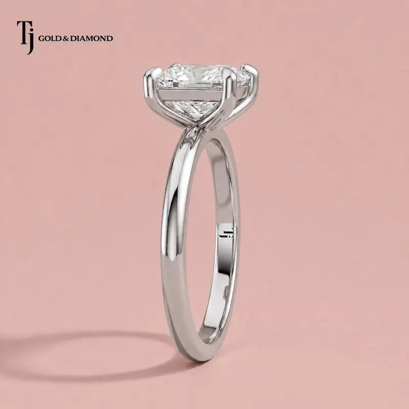 Side profile of a 1.5 carat princess cut 4-claw solitaire engagement ring in 18kt white gold