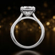 Front-on view of a 1.5 carat princess cut diamond solitaire engagement ring showing the full 18kt white gold band and 4 claw cathedral setting by TJ Diamond.