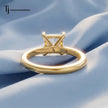 Back view of a 1.5 carat princess cut lab-grown diamond solitaire engagement ring in 18kt yellow gold