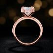 Front-on view of a 1.5 carat princess cut diamond solitaire engagement ring showing the full 18kt rose gold band and 4 double claw setting by TJ Diamond