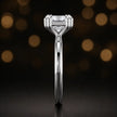 Side profile of a 1.5 carat princess cut diamond solitaire engagement ring showing the 4 double claw setting and 18kt white gold band by TJ Diamond