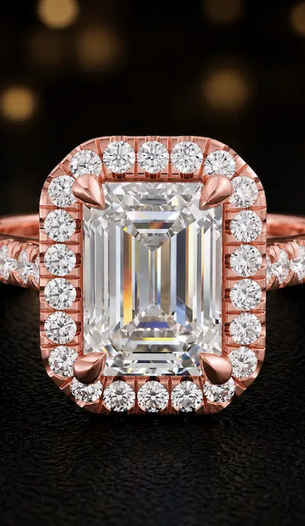 Front view of an emerald cut halo lab-grown diamond engagement ring in 18kt rose gold.