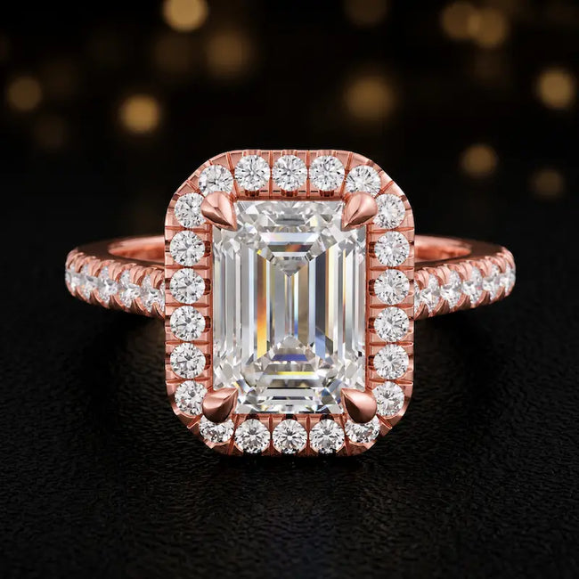 Front view of an emerald cut halo lab-grown diamond engagement ring in 18kt rose gold.