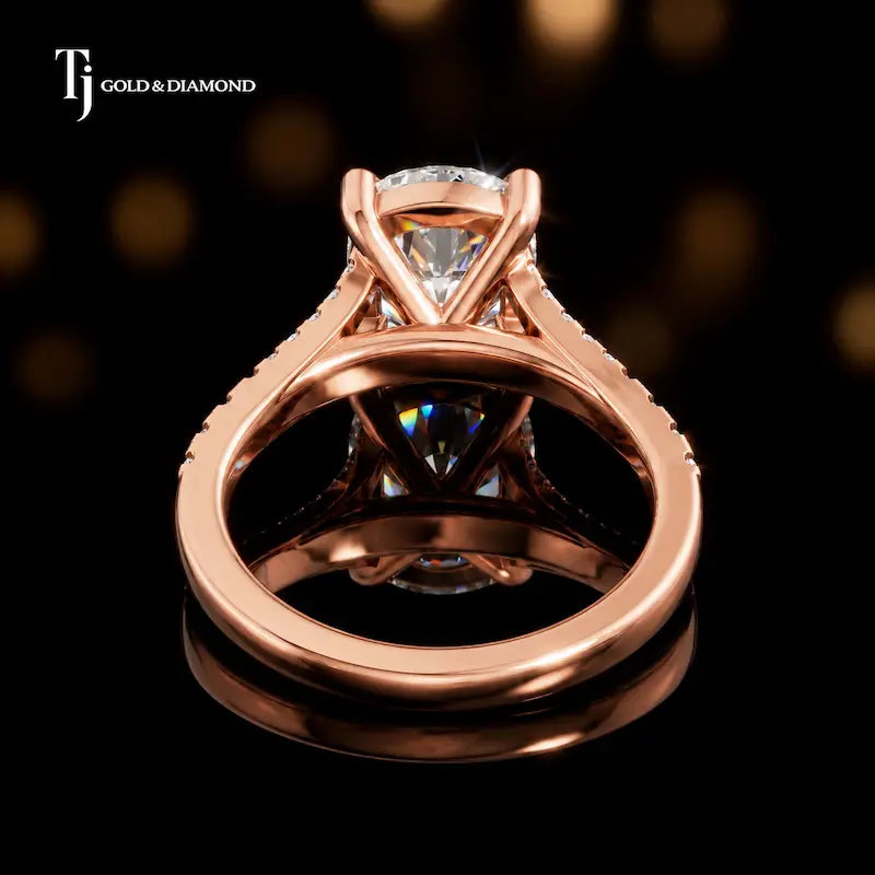 Back view of a cushion cut split shank lab-grown diamond engagement ring in 18kt rose gold.