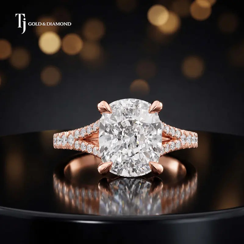 Front view of a cushion cut split shank lab-grown diamond engagement ring in 18kt rose gold.