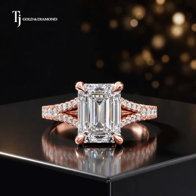 Front view of an emerald cut split shank lab-grown diamond engagement ring in 18kt rose gold.