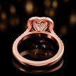 Rear view of a heart cut halo lab-grown diamond engagement ring in 18kt rose gold.