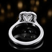 Rear view of a heart cut halo lab-grown diamond engagement ring in 18kt white gold.