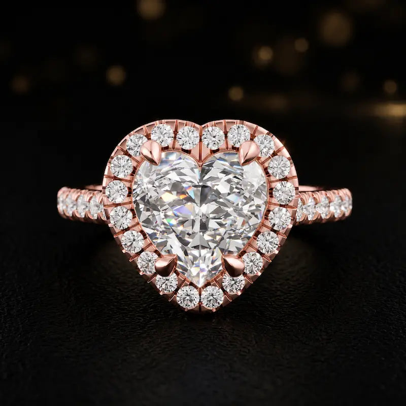 Front view of a heart cut halo lab-grown diamond engagement ring in 18kt rose gold.