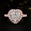 Front view of a heart cut halo lab-grown diamond engagement ring in 18kt rose gold.