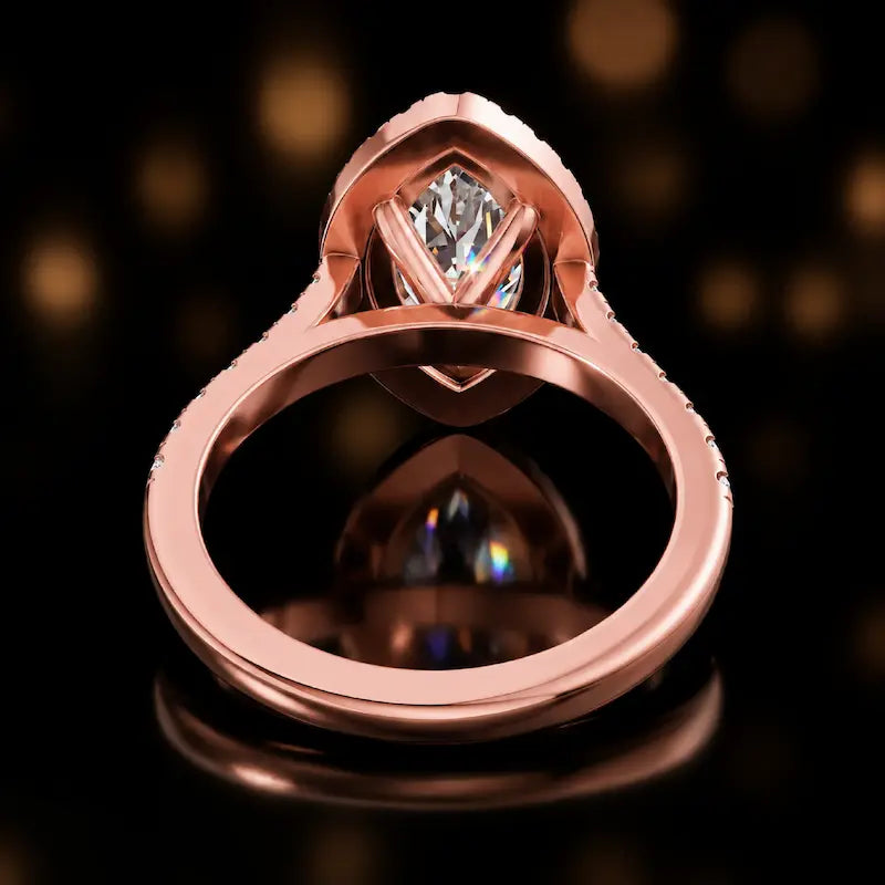 Rear view of a marquise cut halo lab-grown diamond engagement ring in 18kt rose gold.