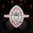 Front view of a marquise cut halo lab-grown diamond engagement ring in 18kt rose gold.