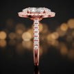 Side profile of a marquise cut halo lab-grown diamond engagement ring in 18kt rose gold.