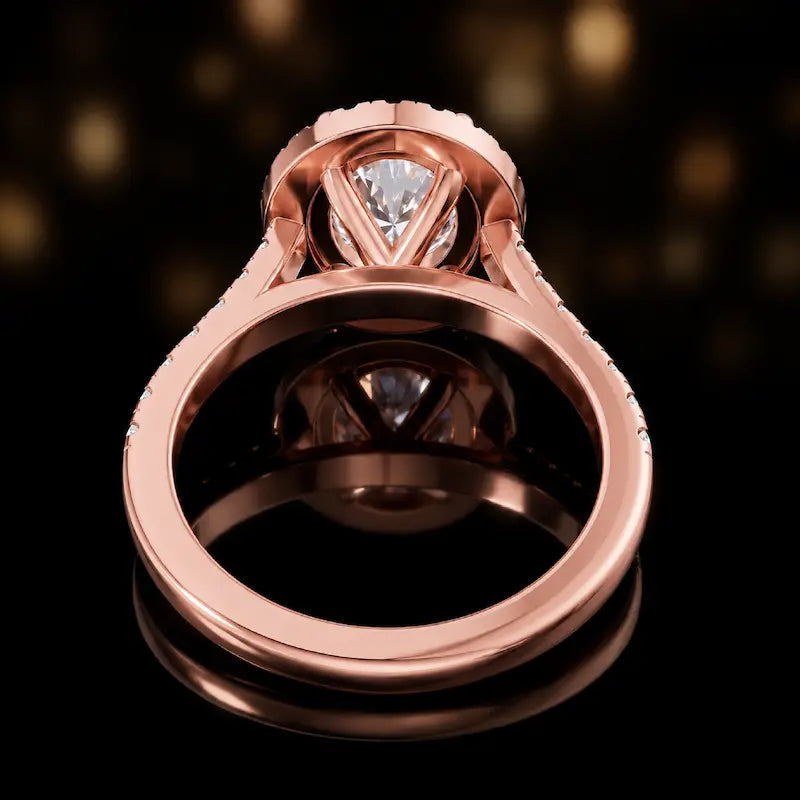Rear view of an oval cut halo lab-grown diamond engagement ring in 18kt rose gold.