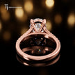 Back view of an oval cut split shank lab-grown diamond engagement ring in 18kt rose gold.