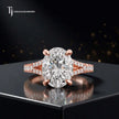 Front view of an oval cut split shank lab-grown diamond engagement ring in 18kt rose gold.