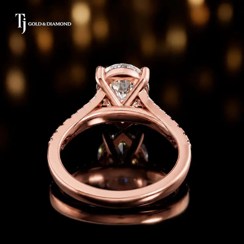 Back view of a pear cut split shank lab-grown diamond engagement ring in 18kt rose gold.