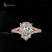 Front view of a pear cut split shank lab-grown diamond engagement ring in 18kt rose gold.