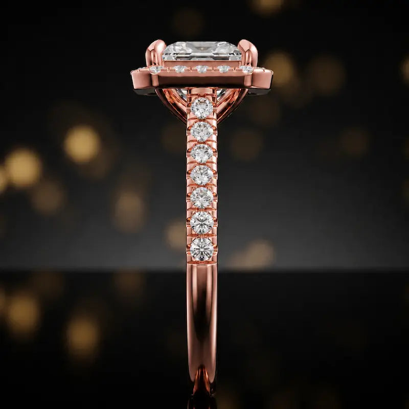 Side profile of a princess cut halo lab-grown diamond engagement ring in 18kt rose gold.