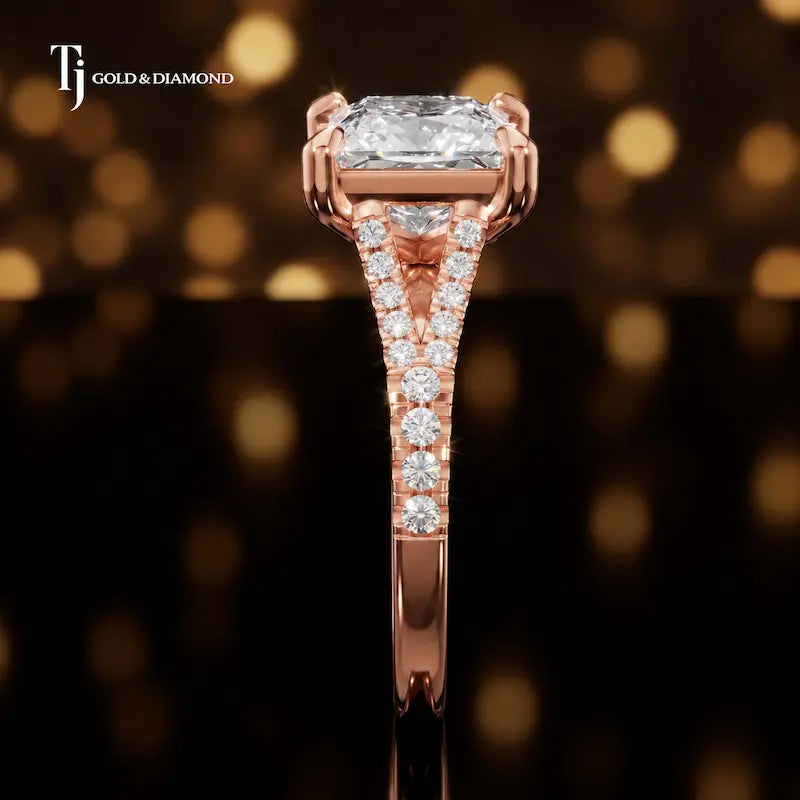 Side profile of a princess cut split shank lab-grown diamond engagement ring with diamond-set shoulders in 18kt rose gold.